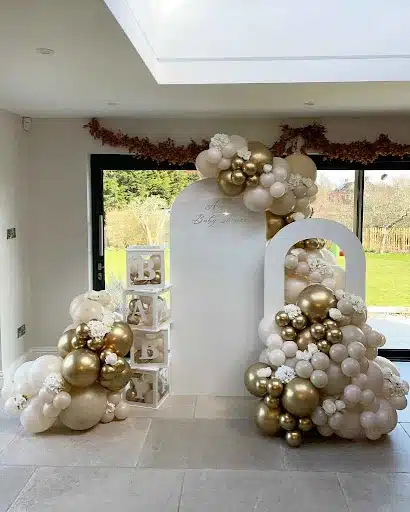 Elegant Balloon Arch with Gold Accents Back Drop