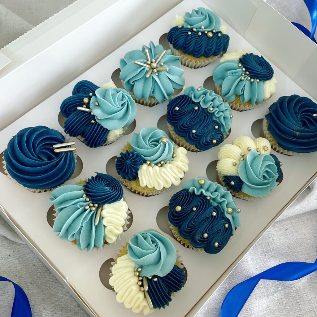.A Box of Blue Delights: Exquisite Baby Shower Cupcakes