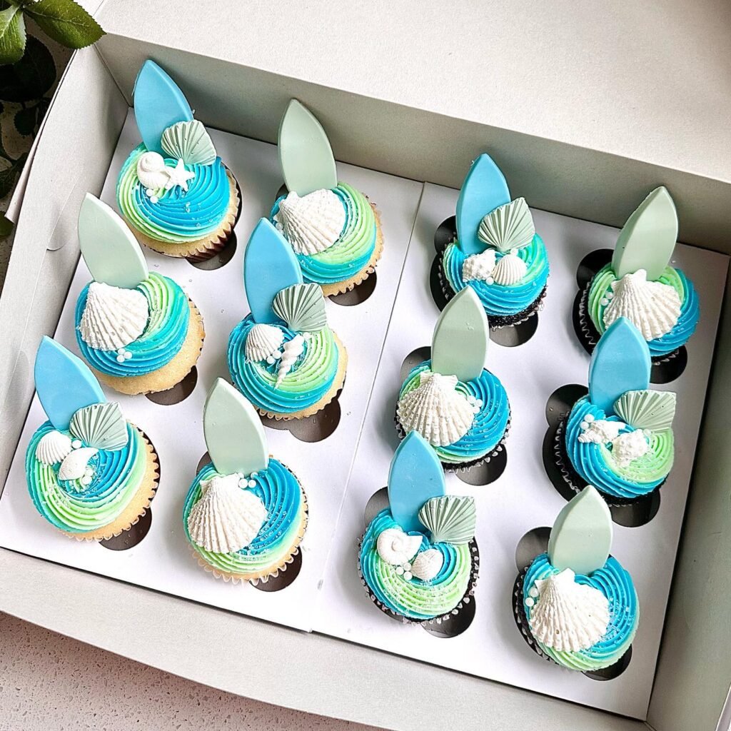 Sweet Waves of Celebration! Surfboard and Shell Topped Cupcakes